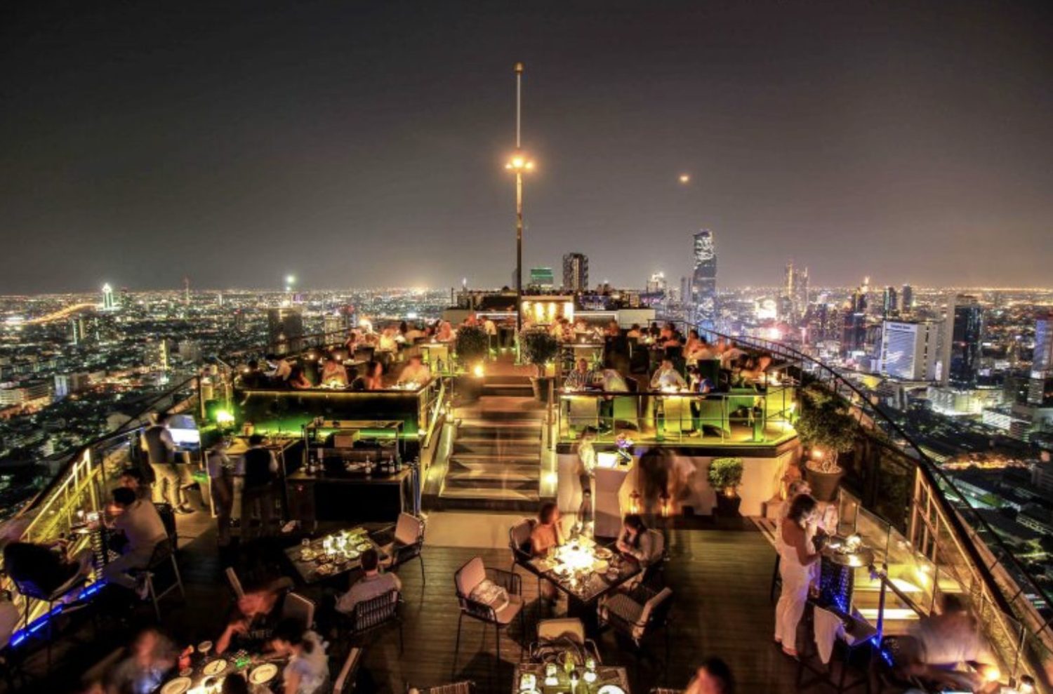 Visit rooftop bars with friends