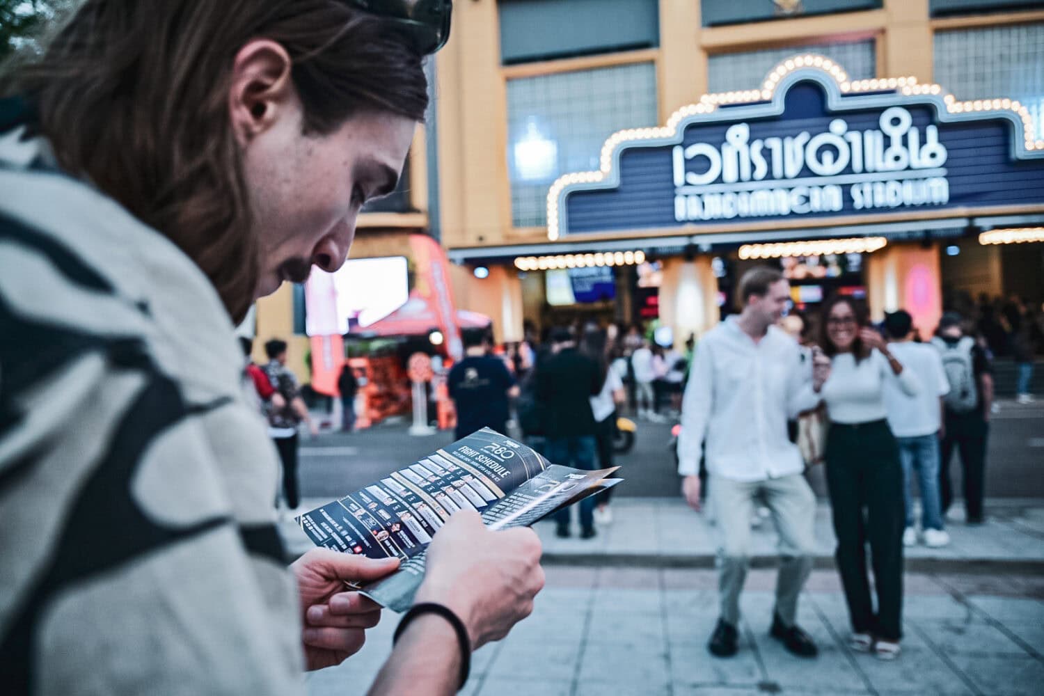 A spectator outside Rajadamnern Stadium