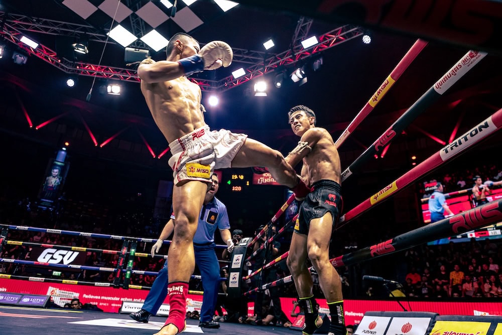 A live Muay Thai fight at Rajadamnern Stadium