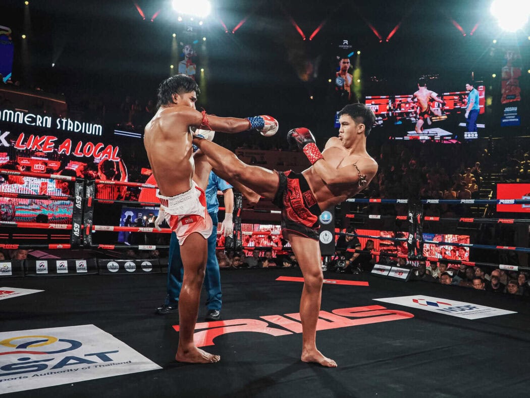 Muay Thai fighters during a match at Rajadamnern Stadium