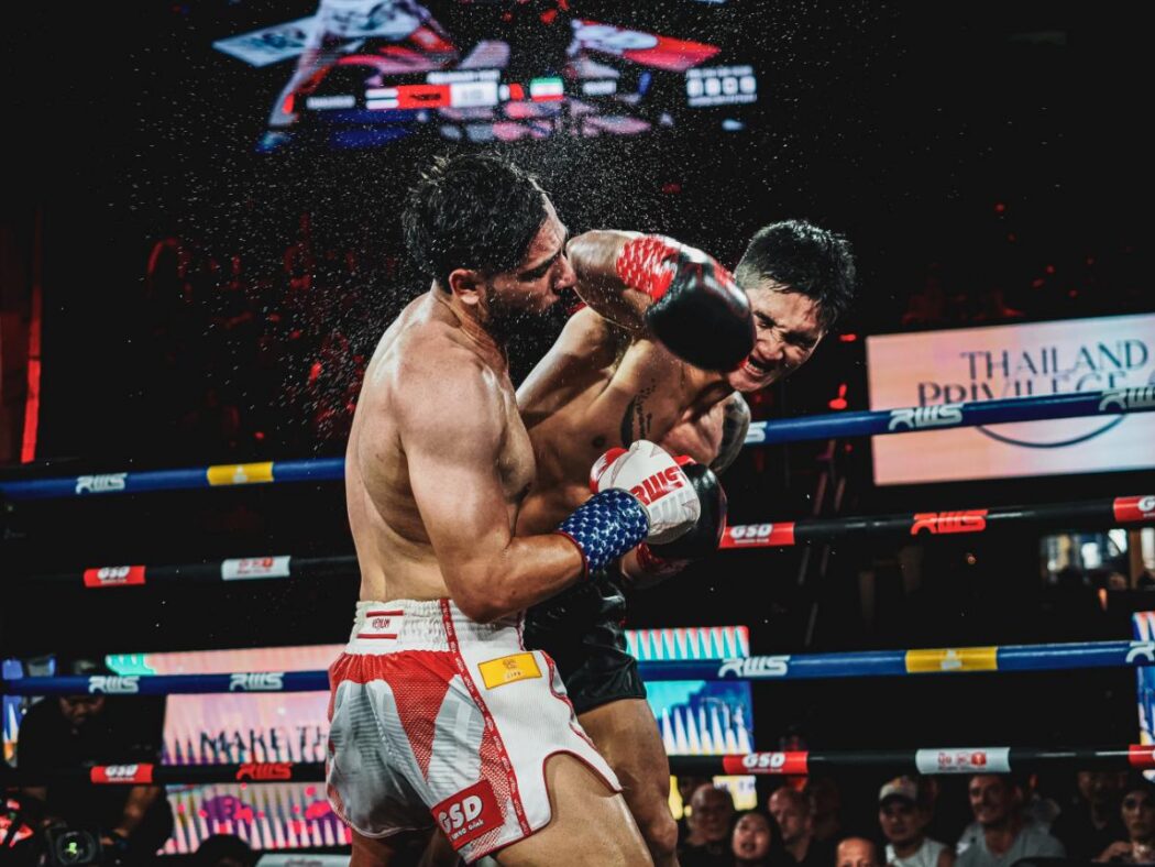Muay Thai fighter lands a devastating elbow strike